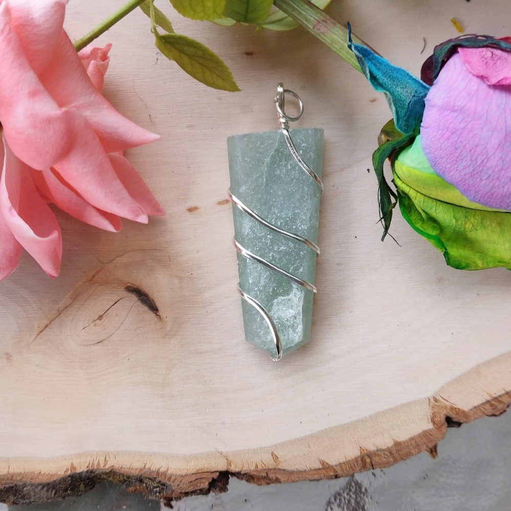 Flat Wire Wrapped Crystal Pendant Comes with Free cord chain.